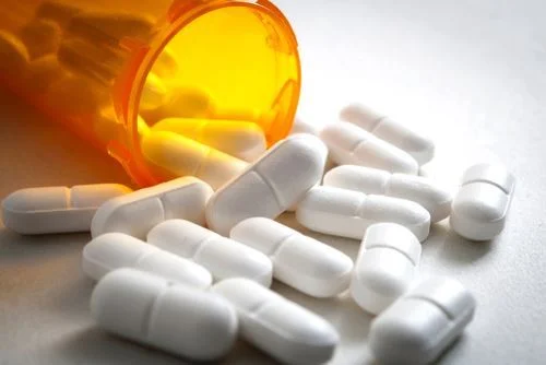 spilled bottle of prescription pills