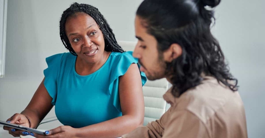 A mentor talking to mentee