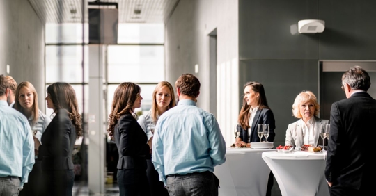 Photo of a work event with alcohol present.