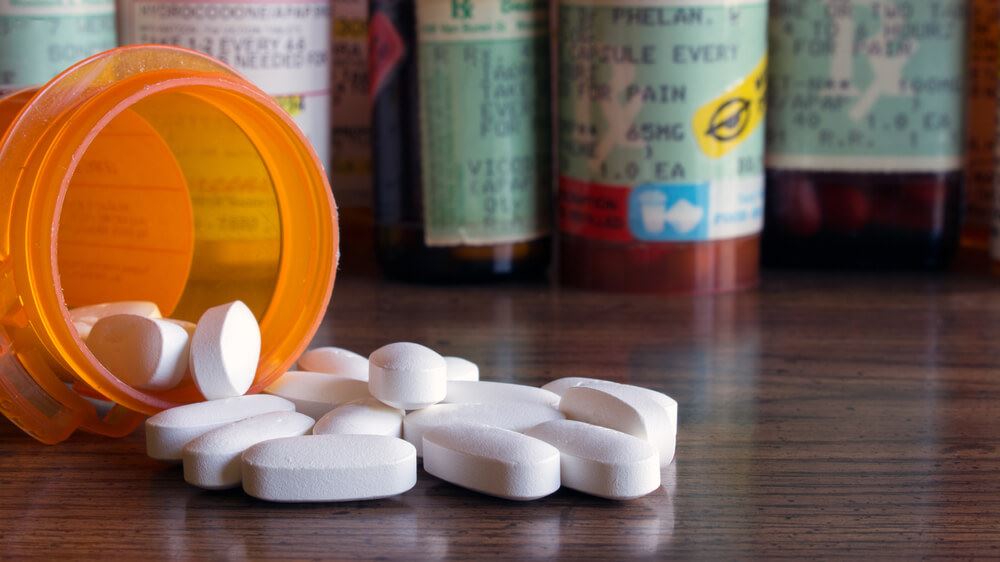spilled bottle of prescription opioid pills